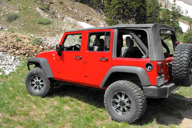 A red 4x4 jeep rented from Anderson Jeep Rentals in Salida, Colorado