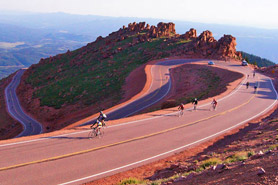 Biking the Pikes Peak Toll Road Scenic Drive in Colorado.